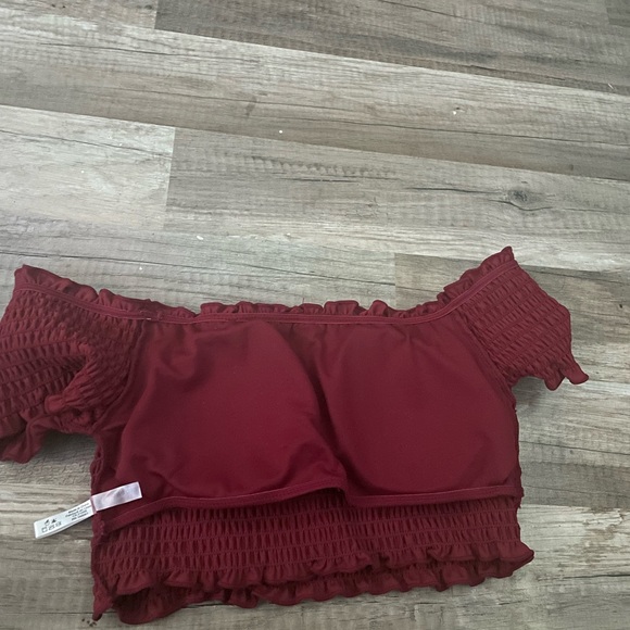 Selling a off the shoulders, burgundy swim top. Size M in kids I believe. - Picture 2 of 3